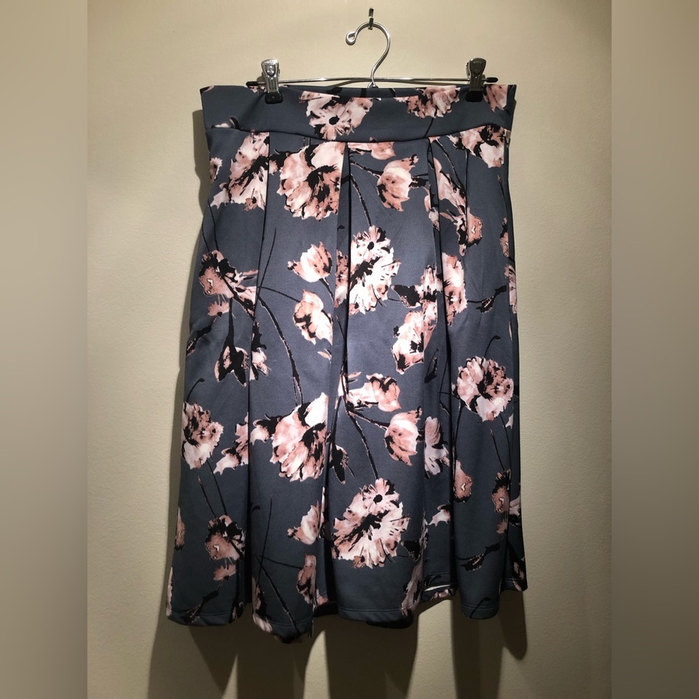 Floral knee length, high waisted skirt.
